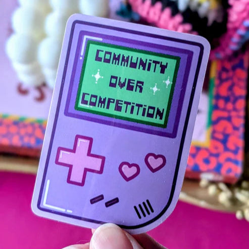 Community Over Competition Sticker